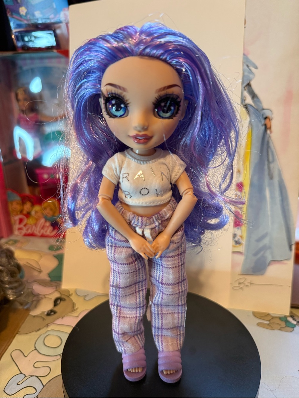 Fashion Doll with Vibrant Purple Hair and Plaid Pants
